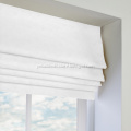 white fabric roman blinds